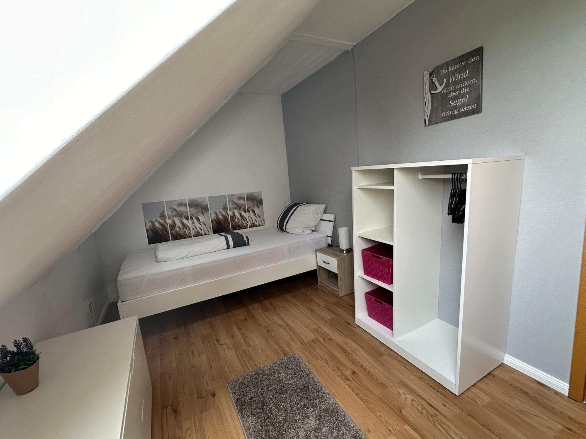 Rosenhaus Esens - Wohnung Backbord Esterno foto